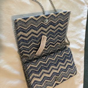 Ladies designer hand bag.